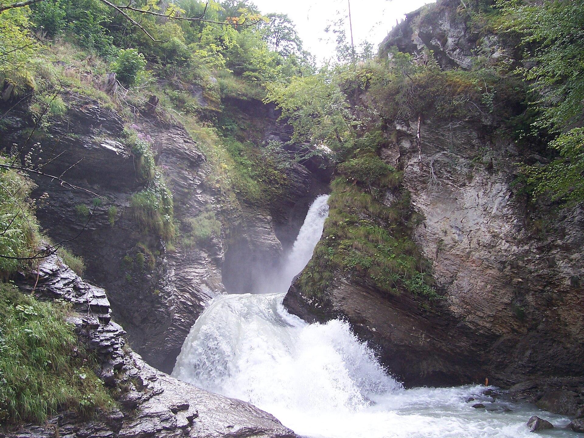 The upper Reichenbach Falls thundering into their gorge
